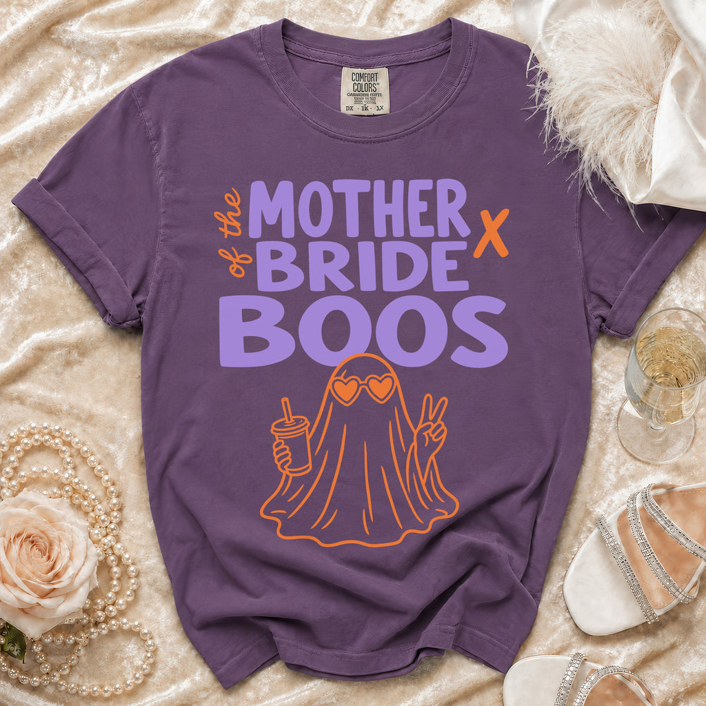 Purple t-shirt featuring the text Mother of the Bride Boos and an orange ghost graphic.