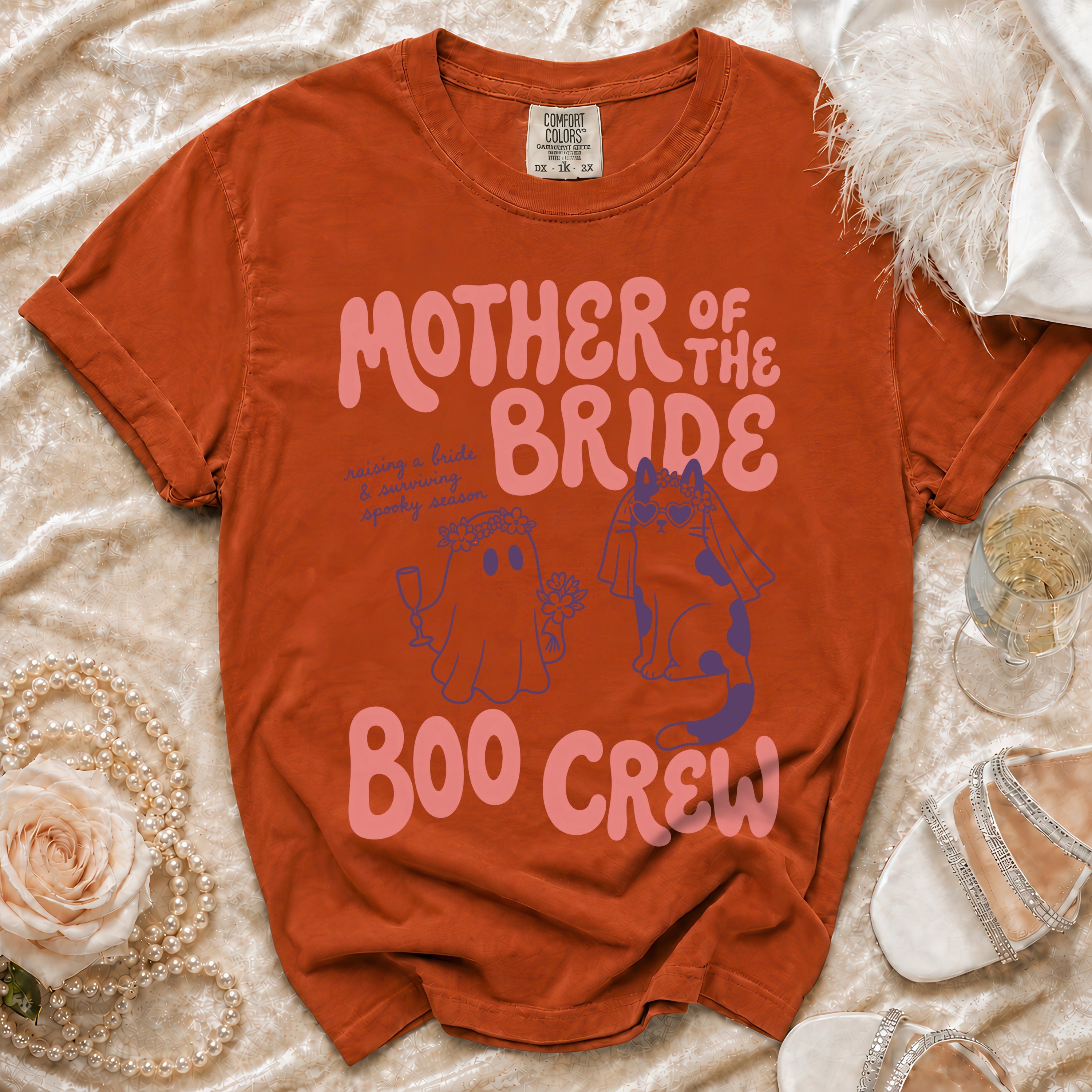 Orange t-shirt with "Mother of the Bride Boo Crew" text and cartoon ghosts.