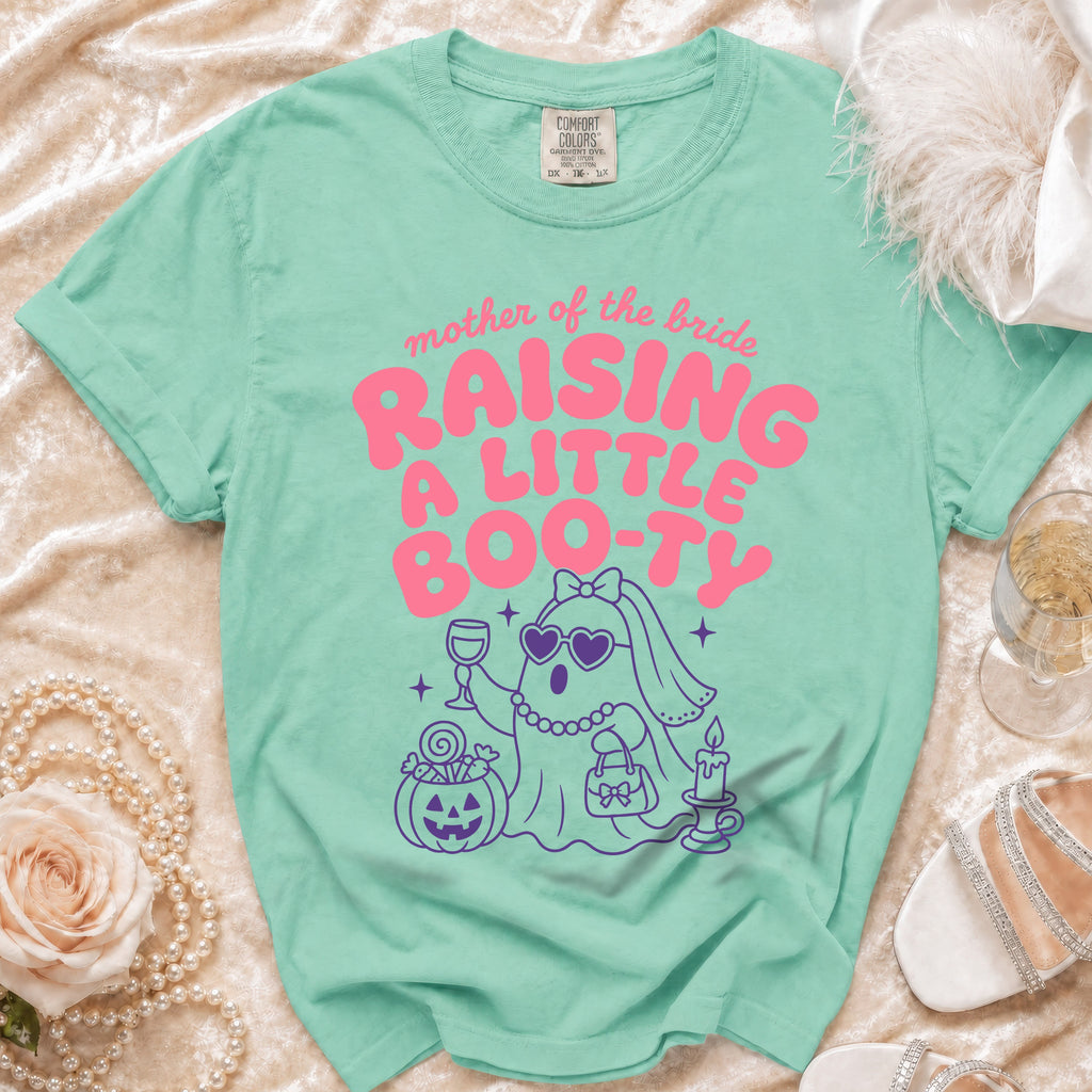 Mint t-shirt with "Mother of the Bride Raising a Little Boo-ty" text and ghost graphic.
