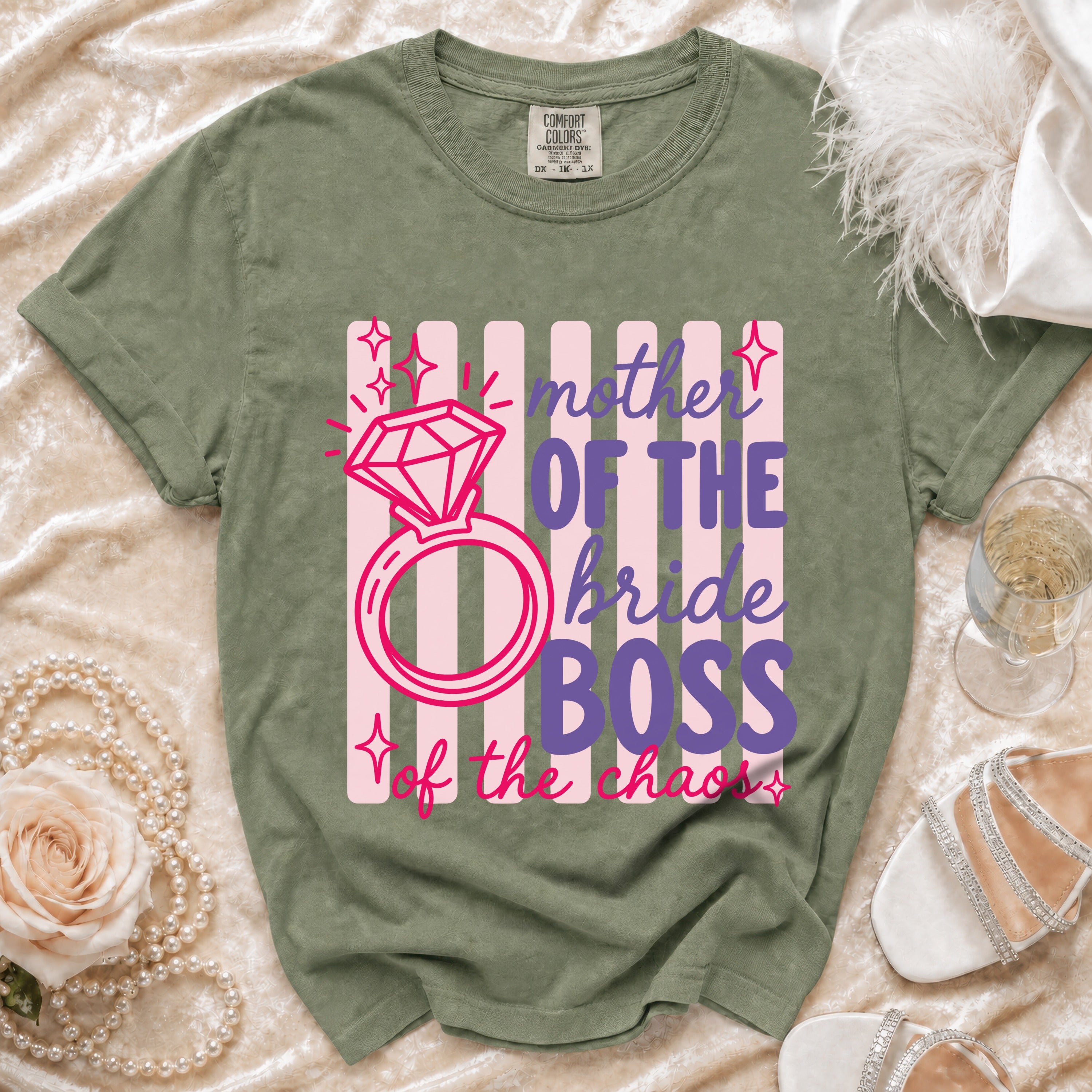Green t-shirt with "Mother of the bride BOSS of the chaos" design.