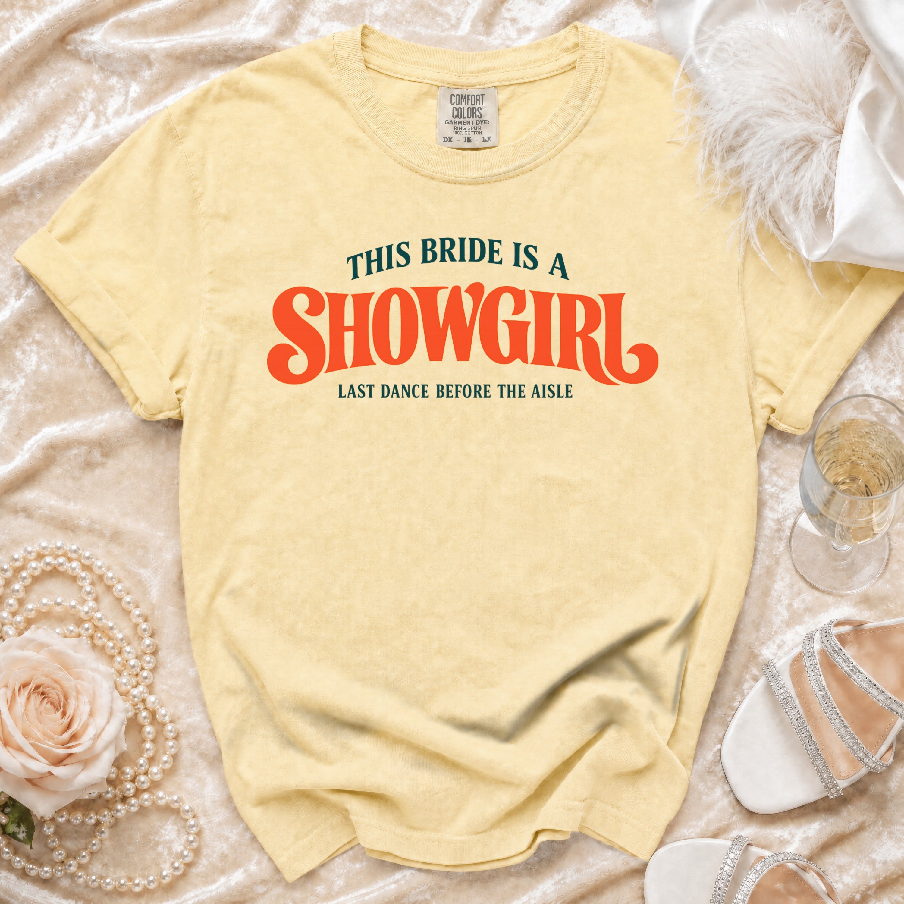 Yellow shirt with "This Bride Is A Showgirl Last Dance Before The Aisle" text.