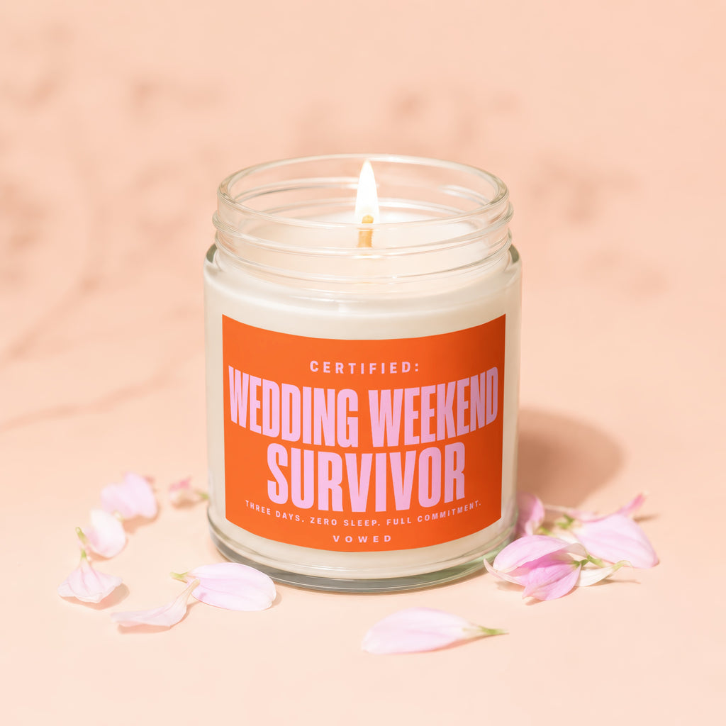 Candle labeled "Certified Wedding Weekend Survivor, Three Days, Zero Sleep, Full Commitment. Vowed."