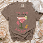 Brown t-shirt with "This Girl Needs A Margarita" graphic of a pink cocktail.