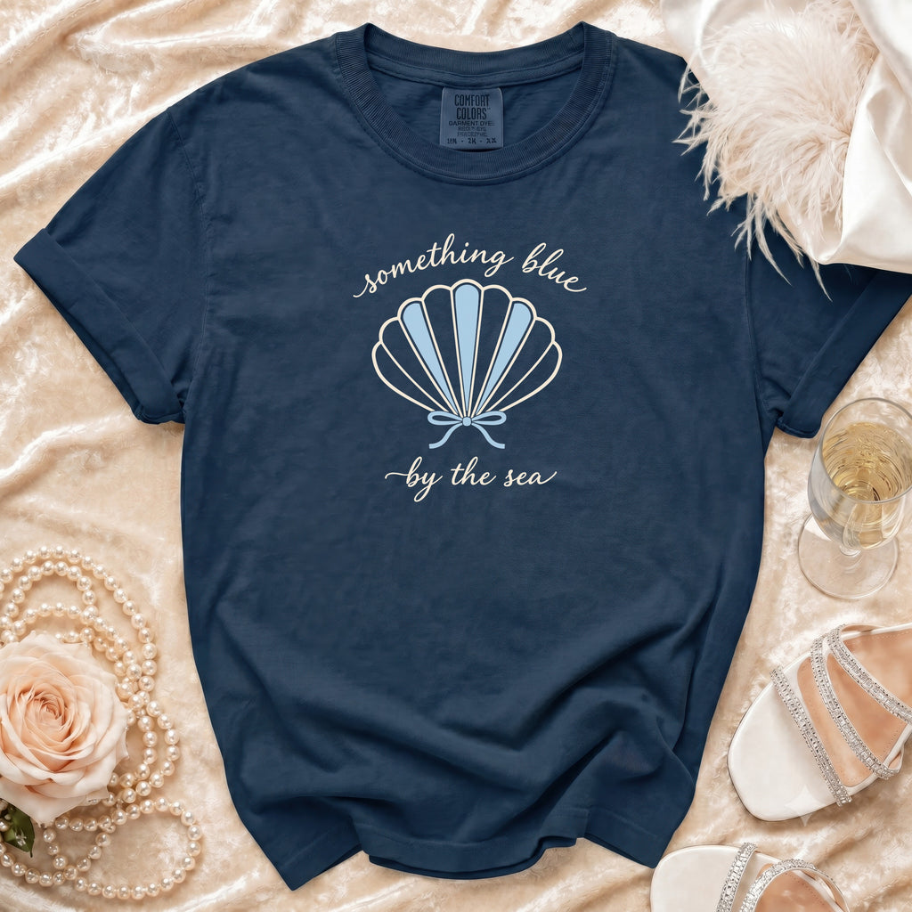 Navy Comfort Colors t-shirt with "something blue by the sea" shell graphic.