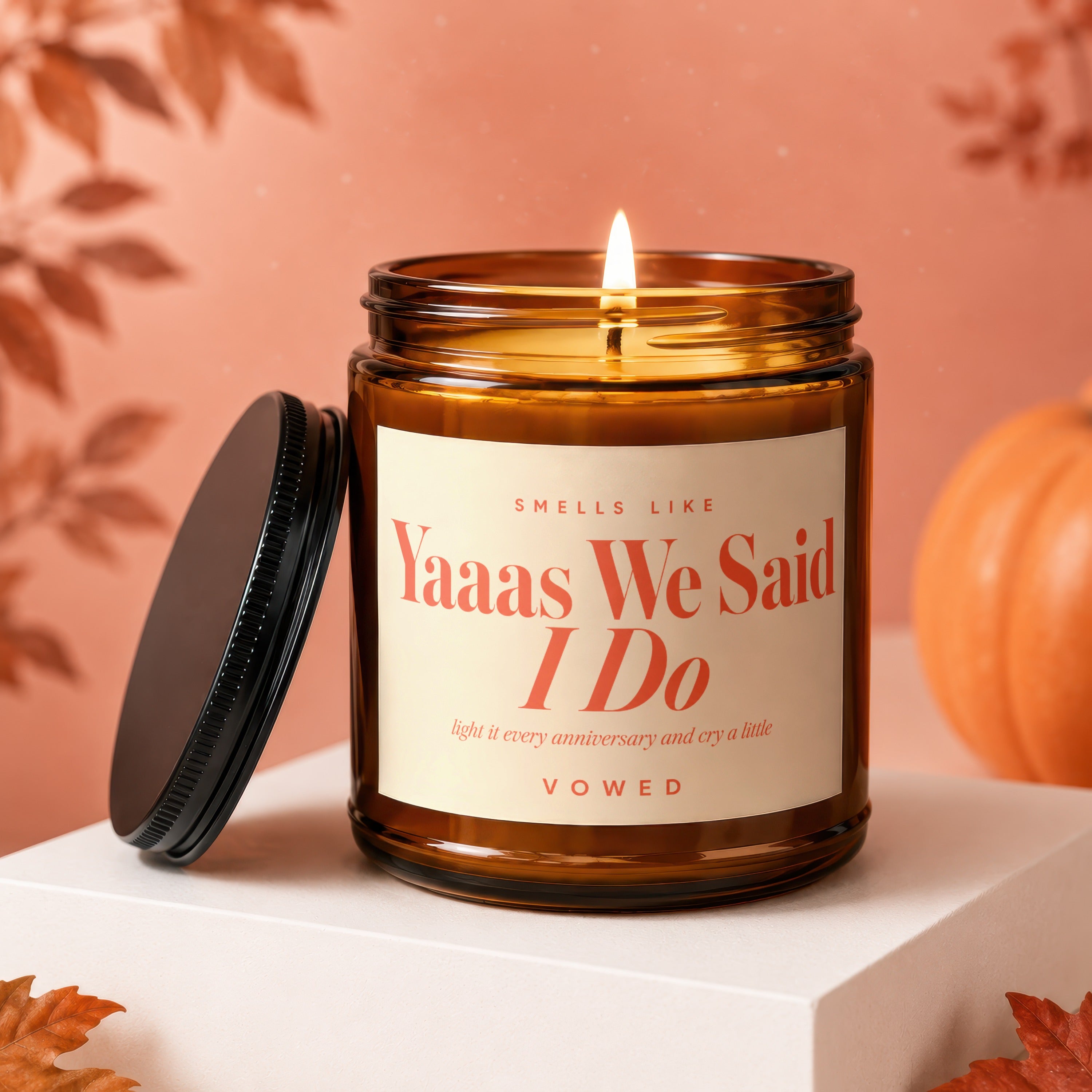 Amber candle with "Yaaas We Said I Do" text.