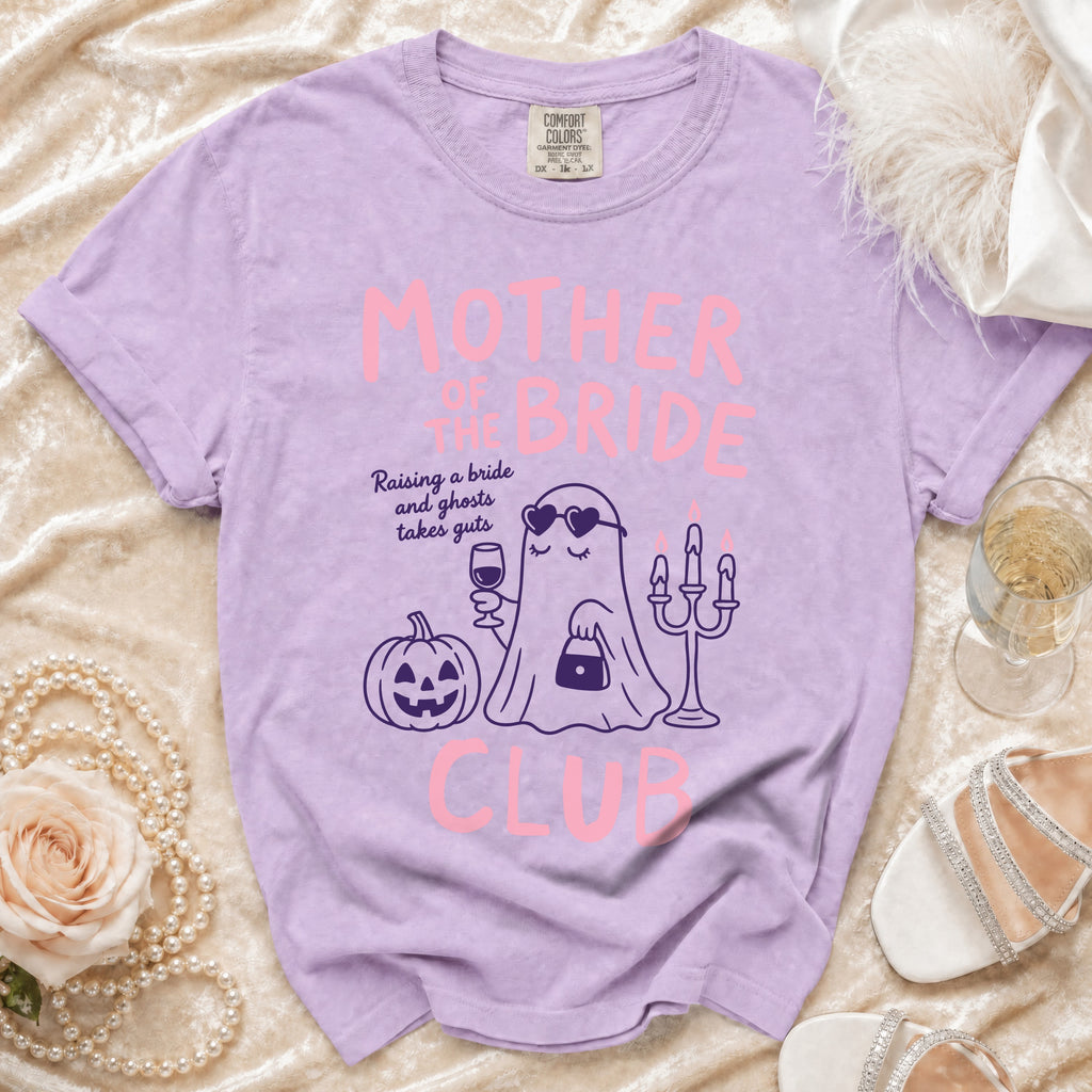 Purple t-shirt with "Mother of the Bride Club" text and ghost graphic.