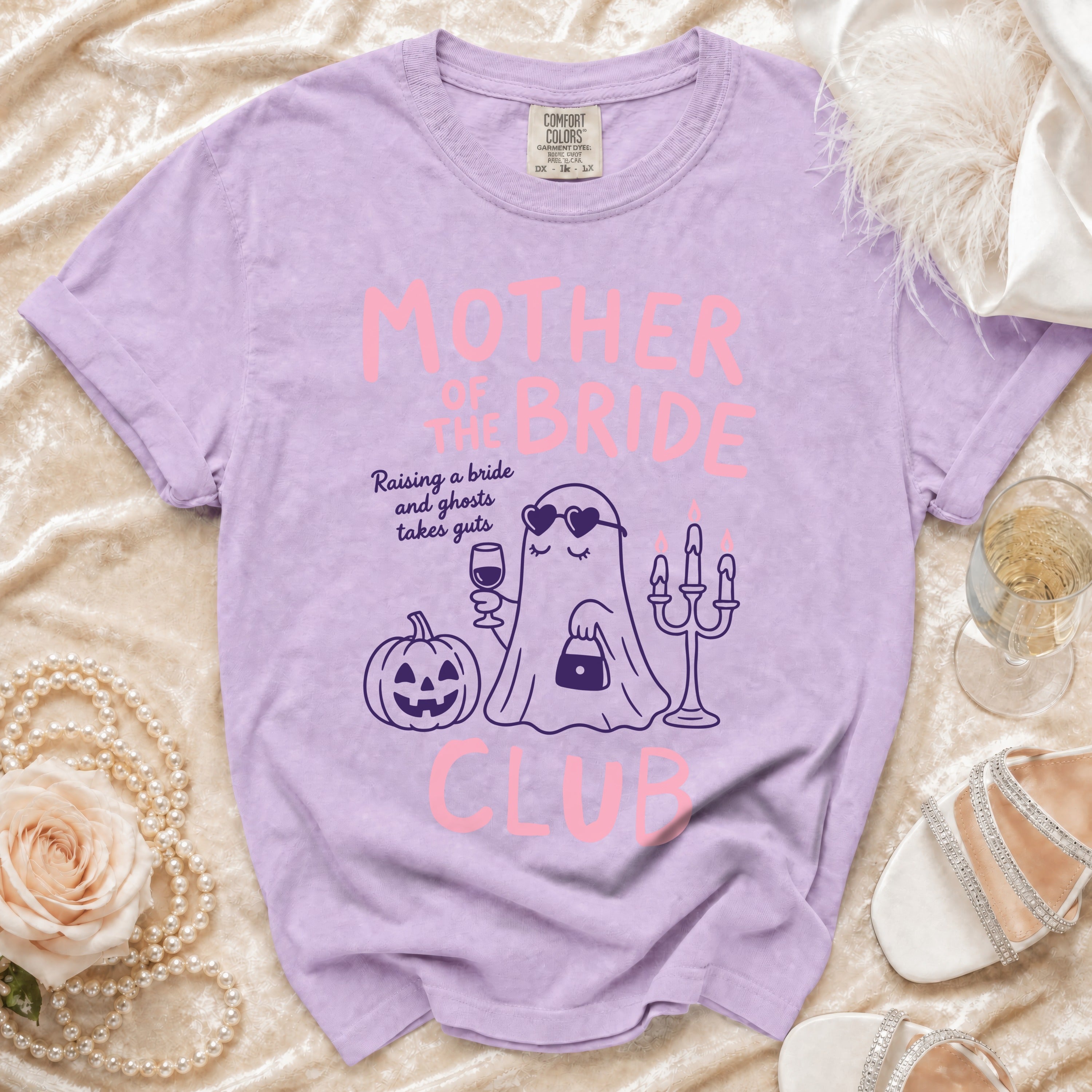 Purple t-shirt with "Mother of the Bride Club" text and ghost graphic.