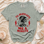 T-shirt with skeleton bride graphic and text "Til Death Gets Me A Minute".