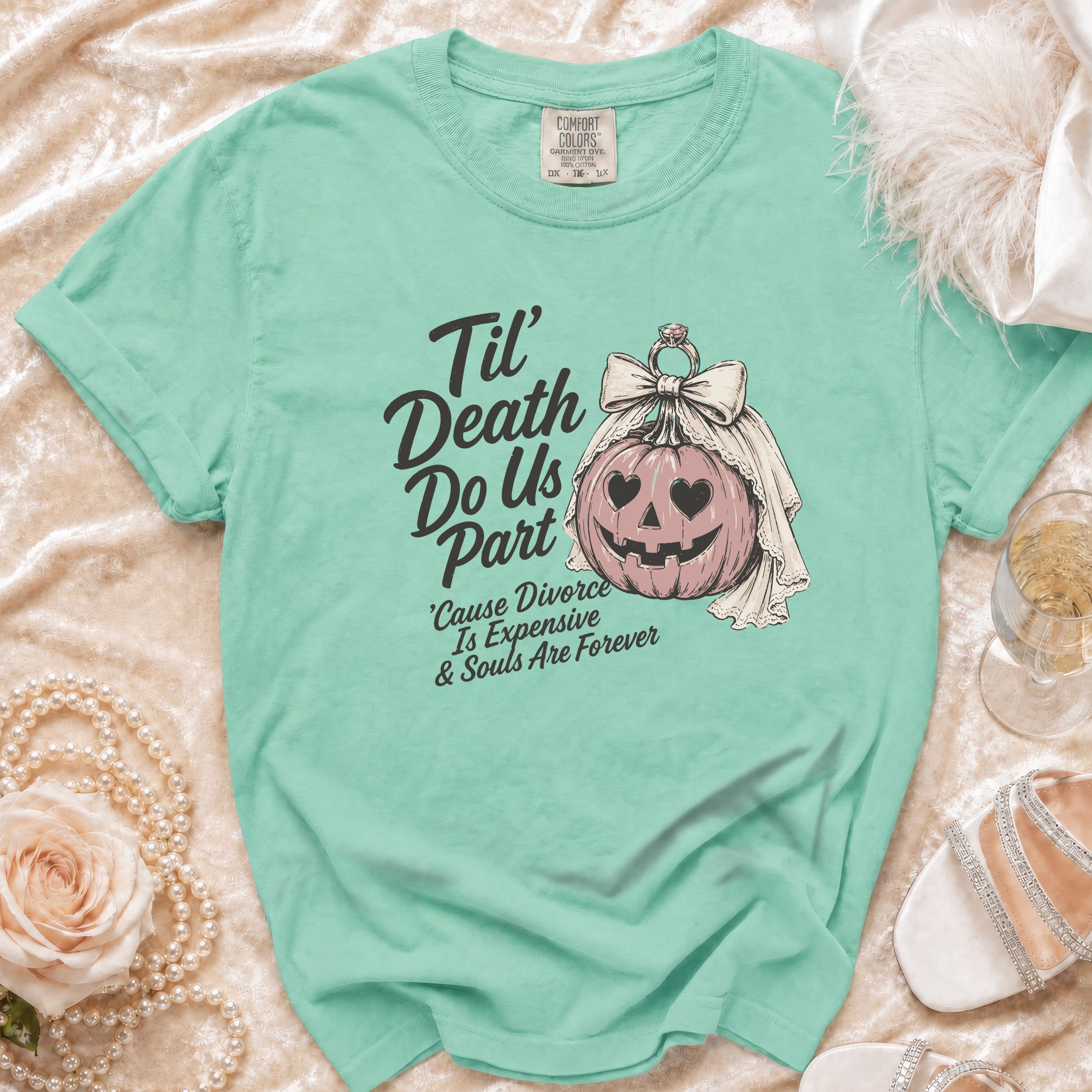 Teal t-shirt with "Til' Death Do Us Part" and a jack-o'-lantern bride graphic.
