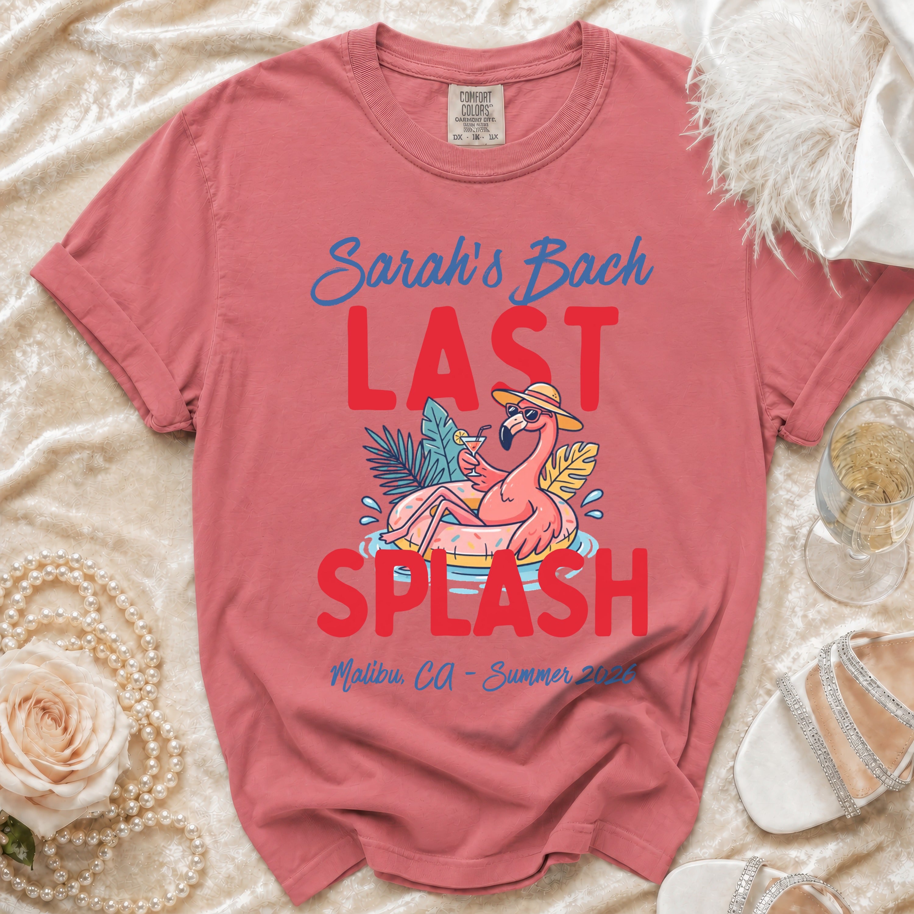 Coral t-shirt with "Sarah's Bach Last Splash" text and flamingo graphic.