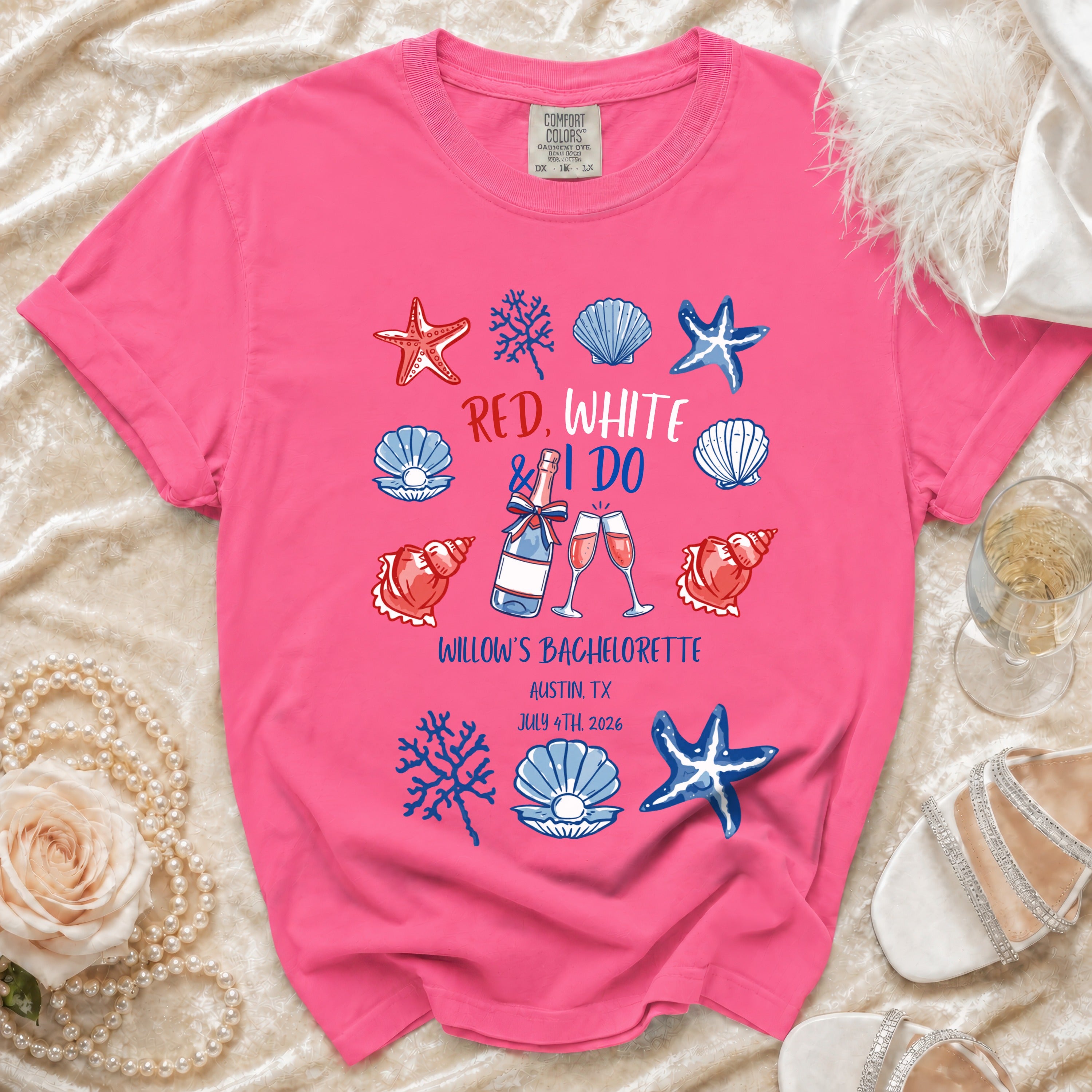 Pink t-shirt with "Red, White & I Do" text and beach-themed graphics.