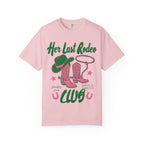 Pink t-shirt with "Her Last Rodeo" text, cowboy boots, and lasso.