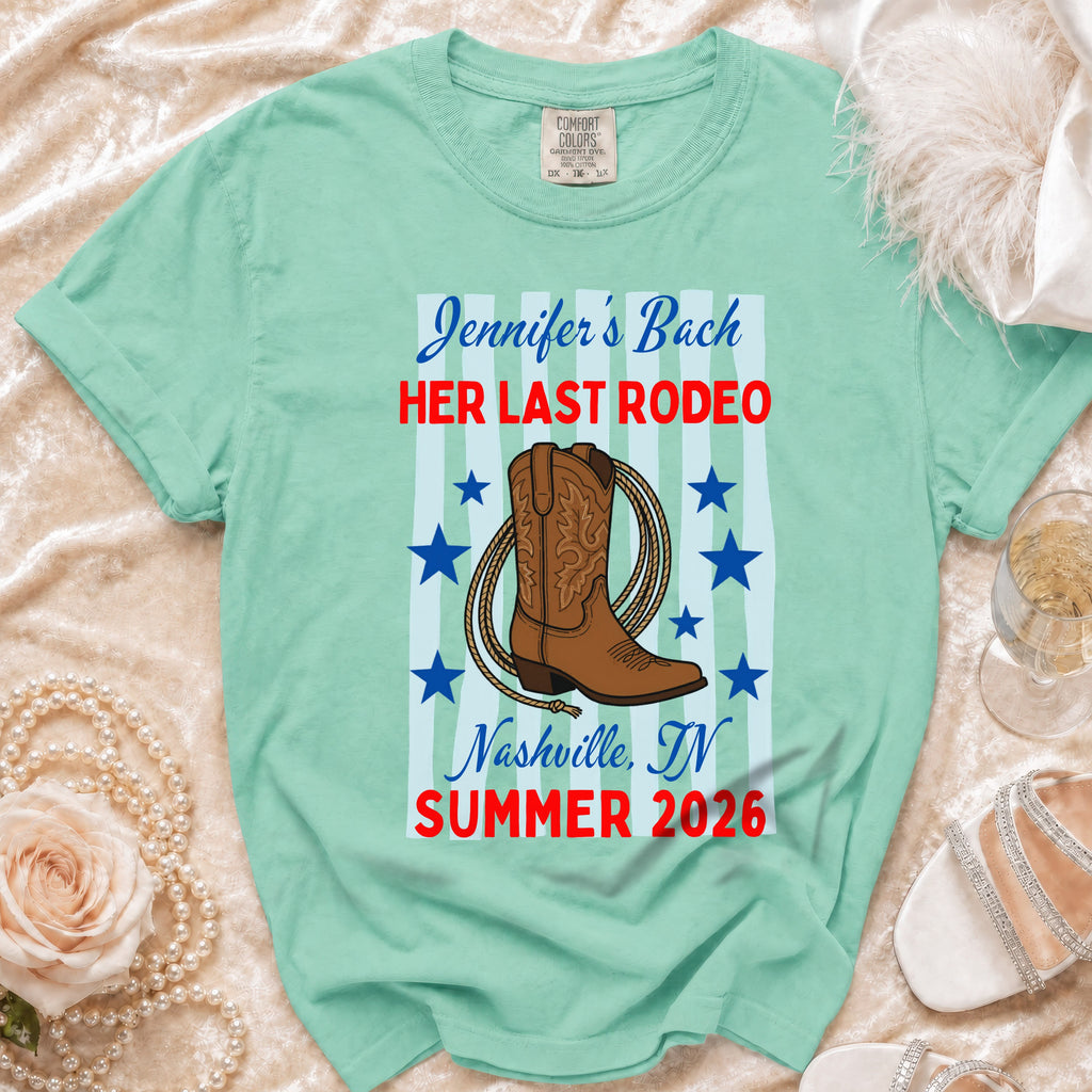 Mint t-shirt with "Jennifer's Bach Her Last Rodeo Nashville, TN Summer 2026" text.