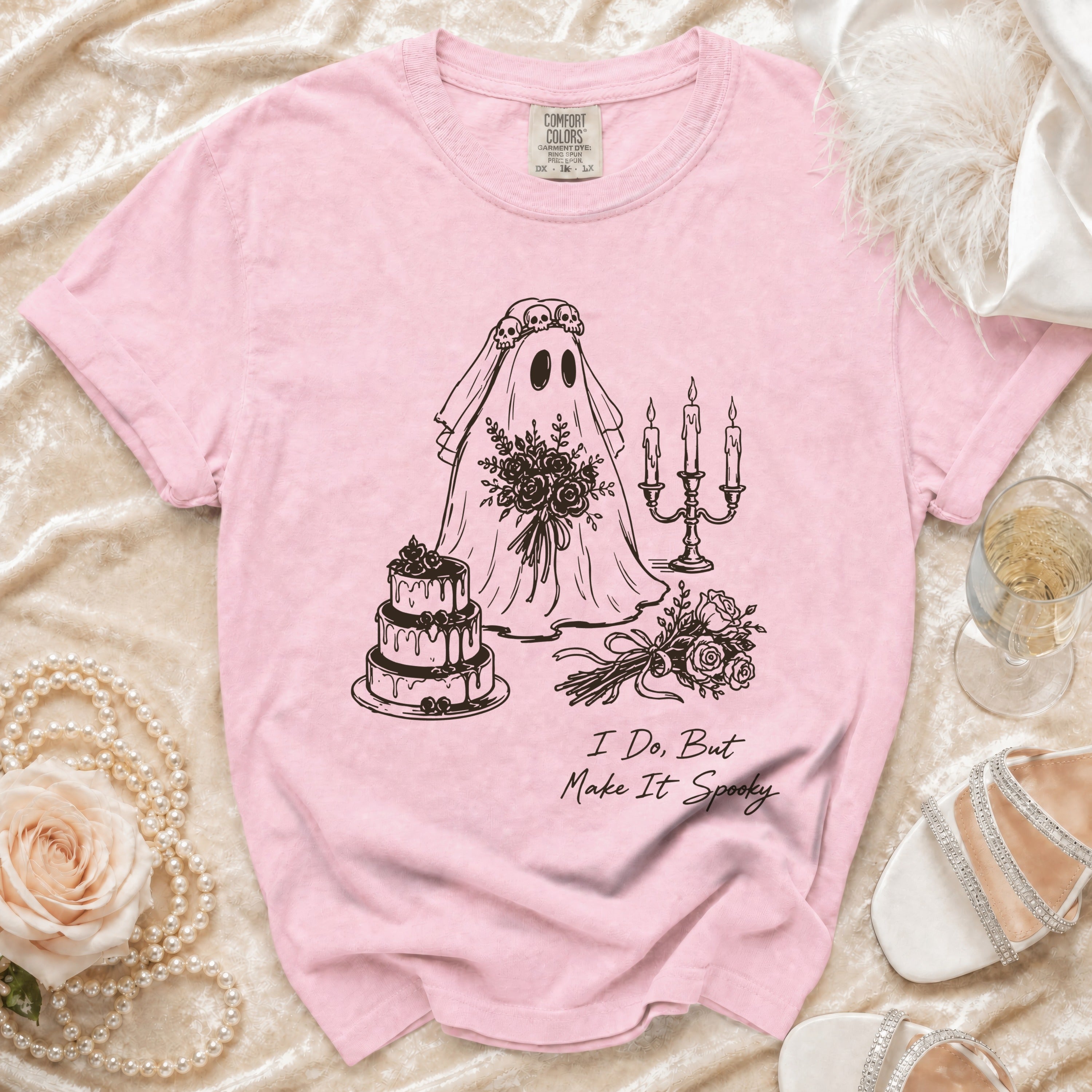 Pink t-shirt with ghost bride graphic and "I Do, But Make It Spooky" text.