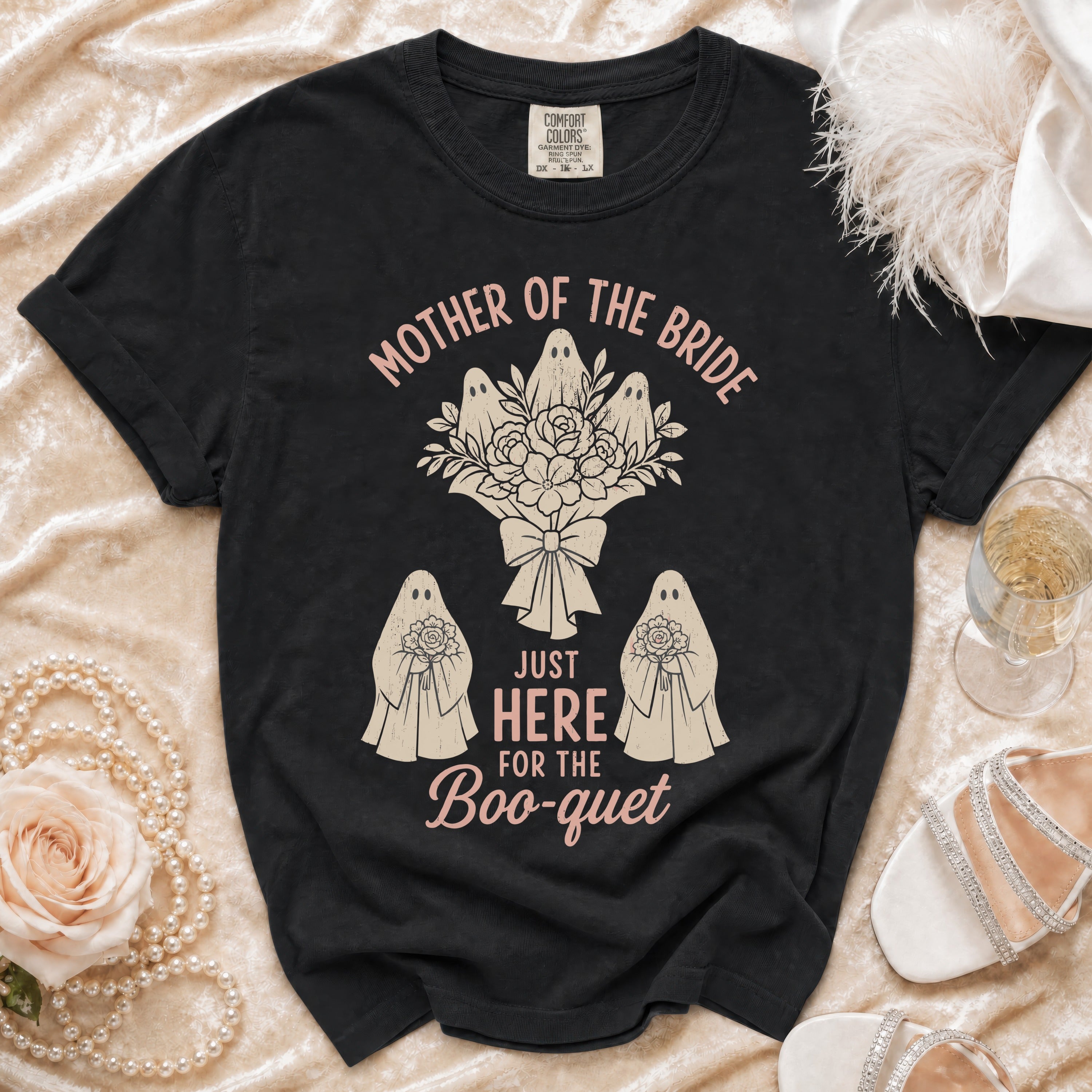 Black t-shirt with "Mother of the Bride Just Here for the Boo-quet" ghost graphic.