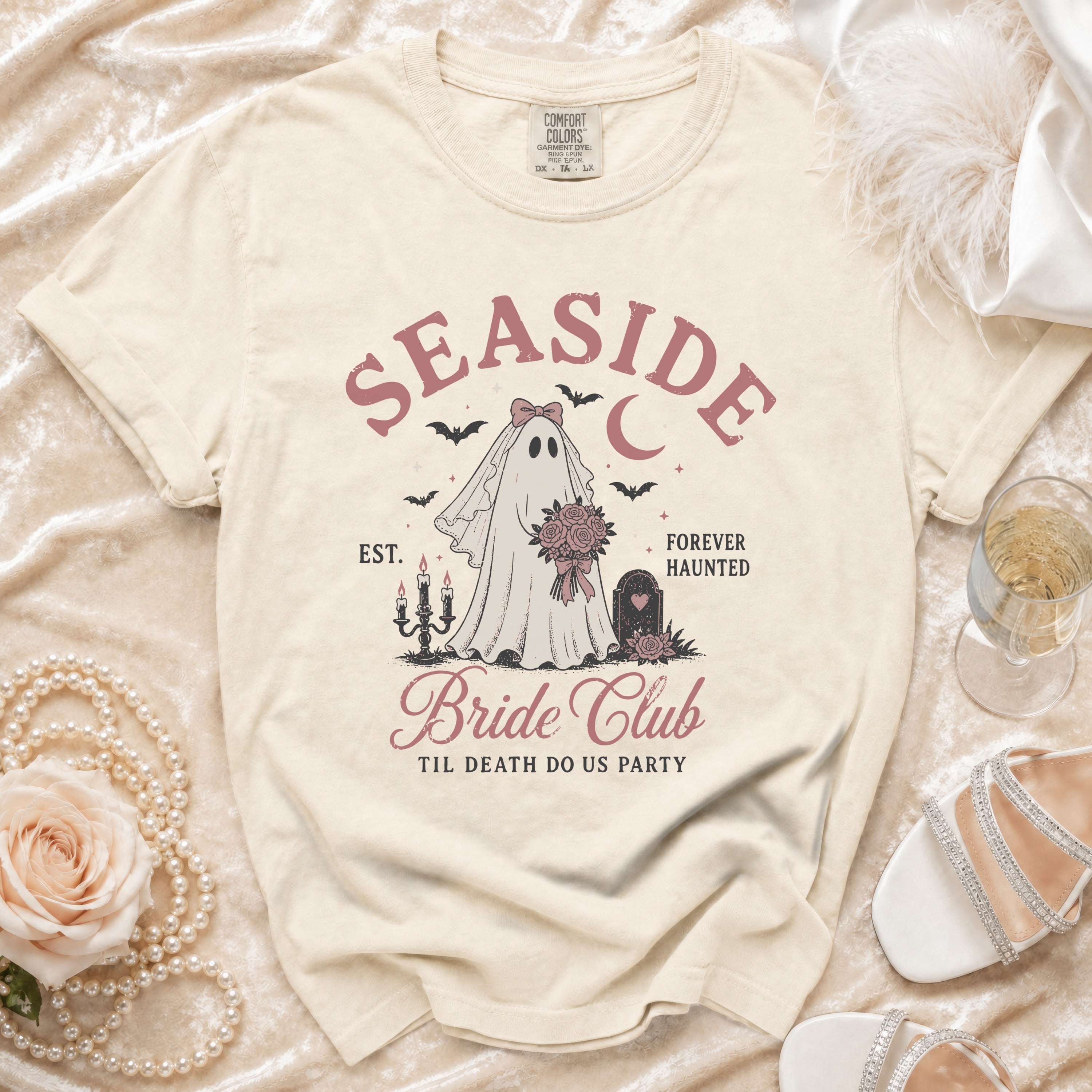 T-shirt with "Seaside Bride Club" design featuring a ghost bride, bats, and moon.
