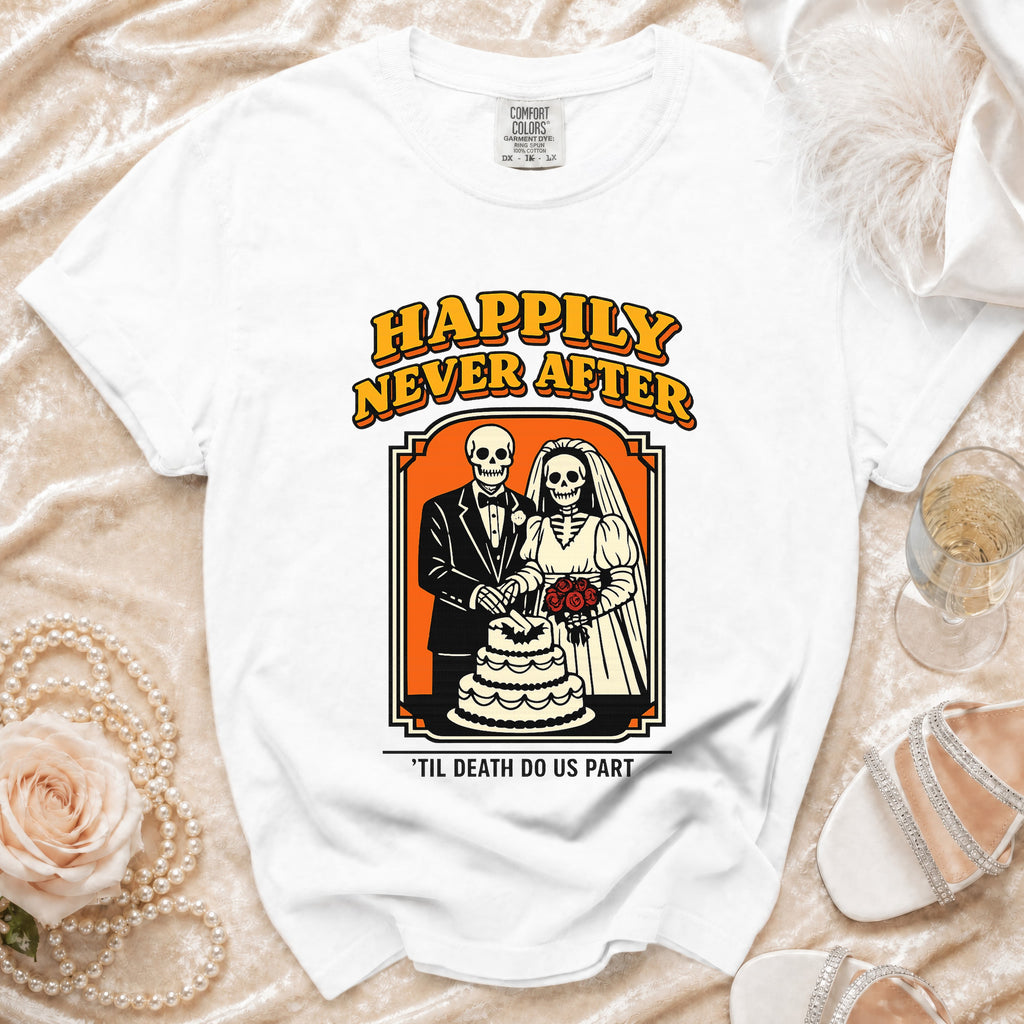 White t-shirt with "Happily Never After" and skeleton bride and groom cutting cake.