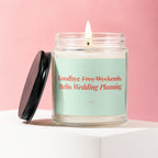 Glass candle with lit wick and black lid, says "Goodbye Free Weekends, Hello Wedding Planning."
