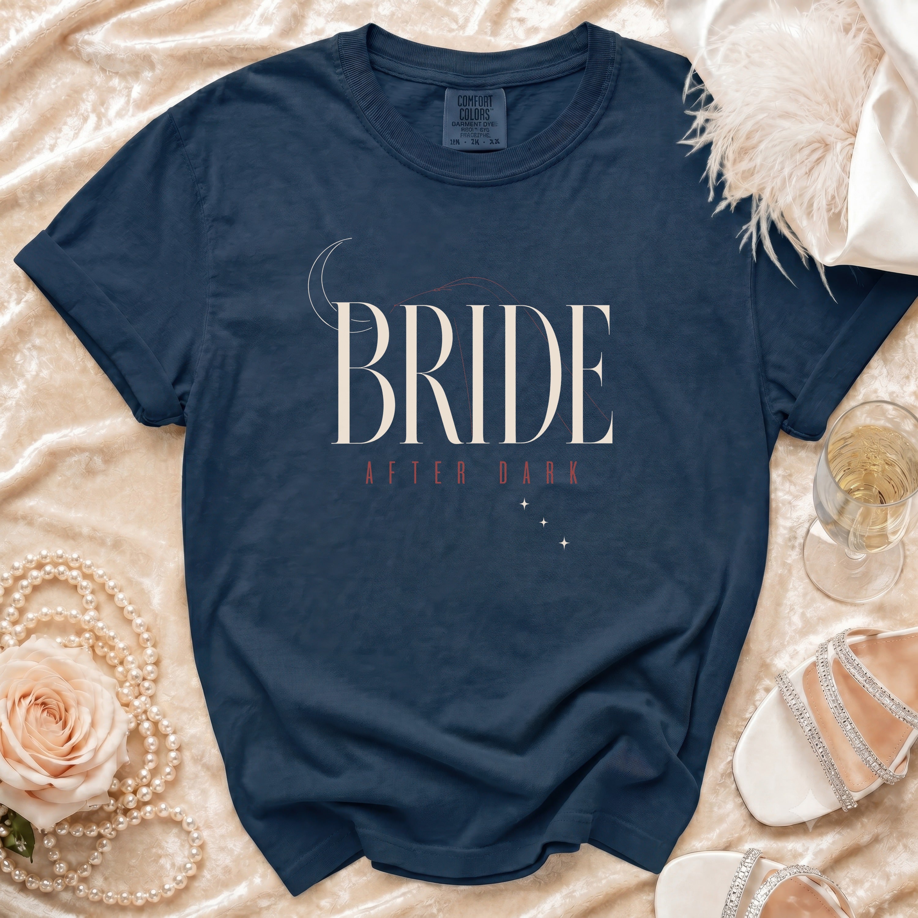 Navy t-shirt with "BRIDE AFTER DARK" text and moon and star graphics.