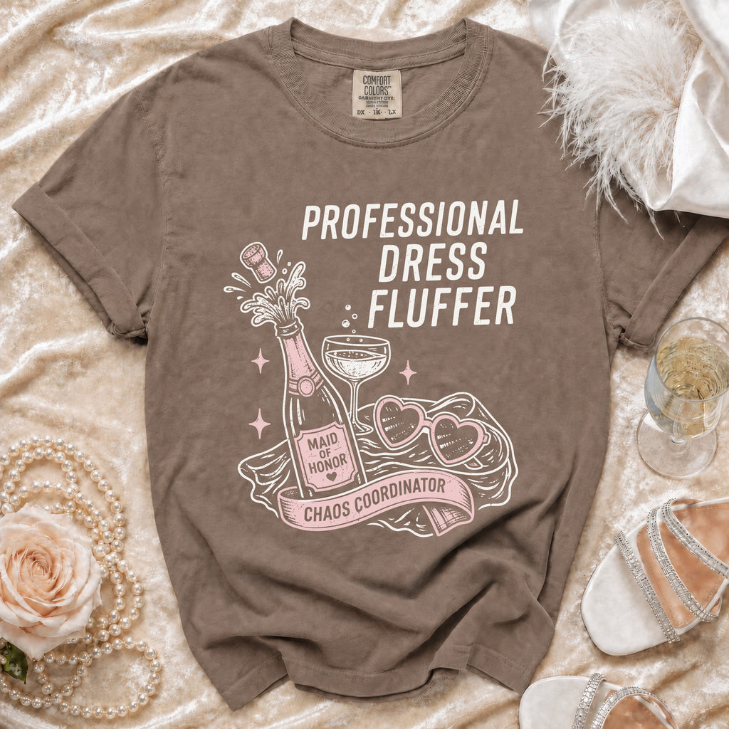 Brown t-shirt with "Professional Dress Fluffer Maid of Honor Chaos Coordinator" text and graphics.