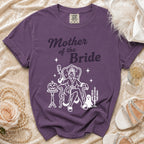 Purple t-shirt with "Mother of the Bride" text and Halloween-themed graphic.