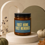 Candle with label "First Home, First Memories. The Boxes Can Wait".