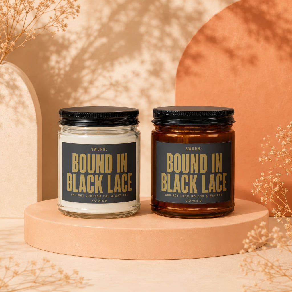 Two candles labeled "Bound in Black Lace" and "And Not Looking For A Way Out".