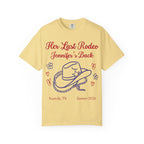 Yellow t-shirt with "Her Last Rodeo Jennifer's Back" text and cowboy hat design.