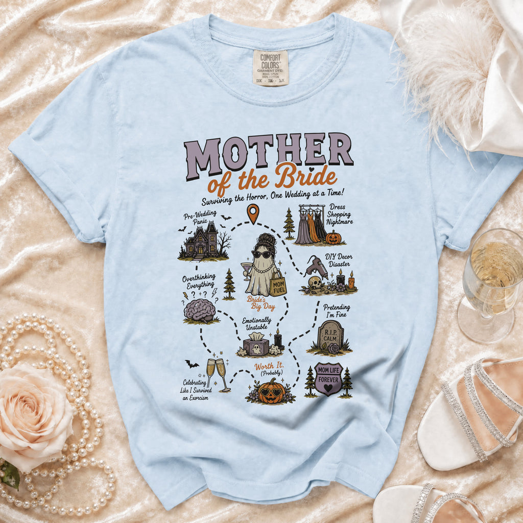 Light blue t-shirt with "Mother of the Bride" graphic and wedding-themed illustrations.