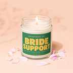Jar candle labeled "Bride Support" with "Vowed" at the bottom.
