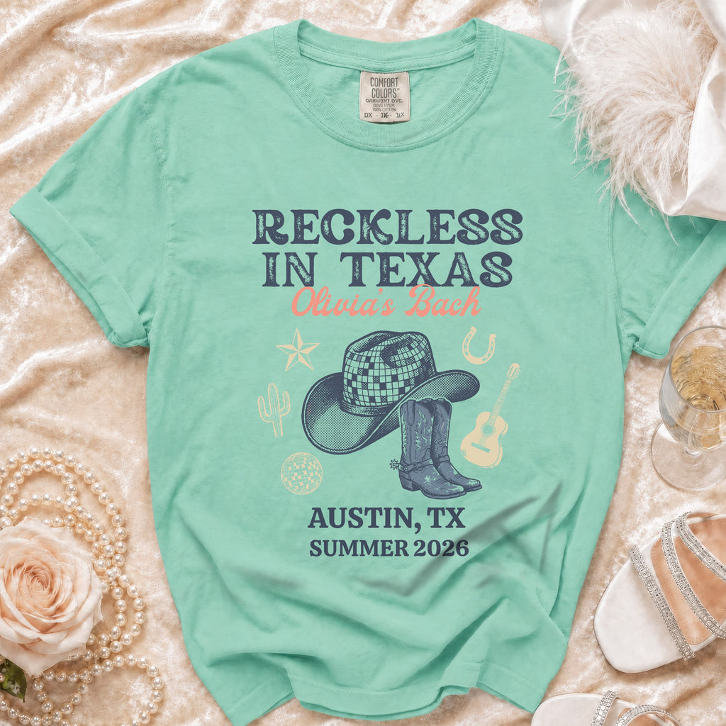 Comfort Colors shirt: Reckless in Texas, Olivia's Bach, Austin, TX, Summer 2026.