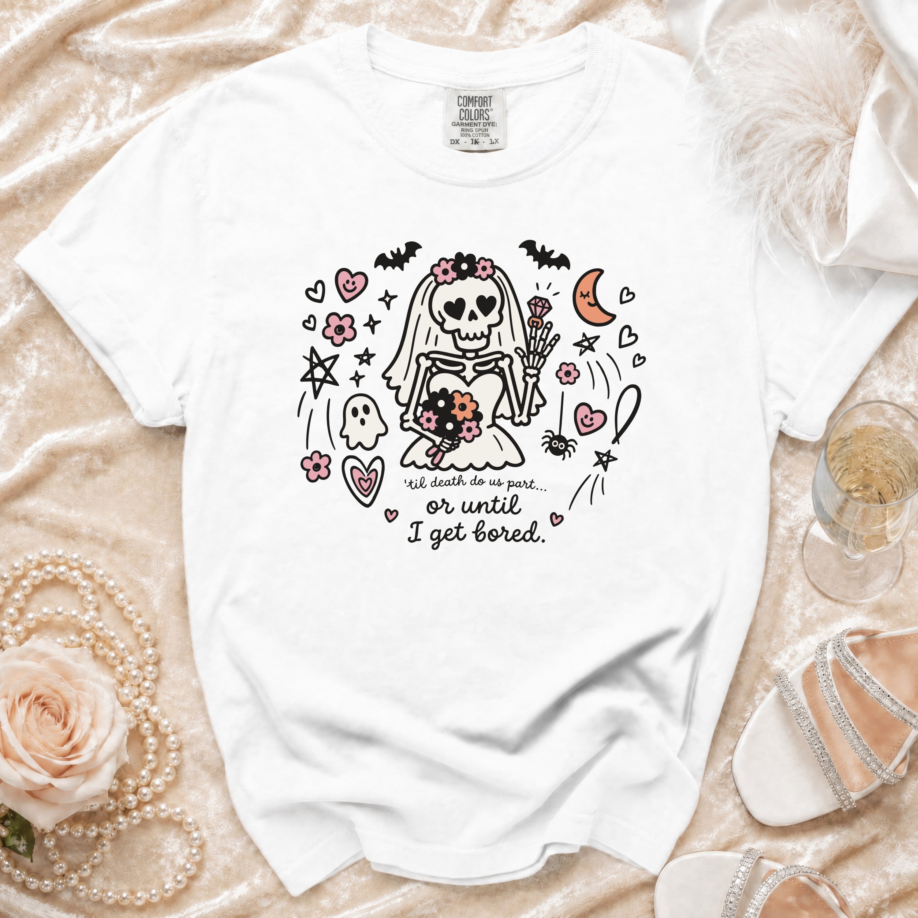 White t-shirt with skeleton bride graphic and text "til death do us part... or until I get bored."