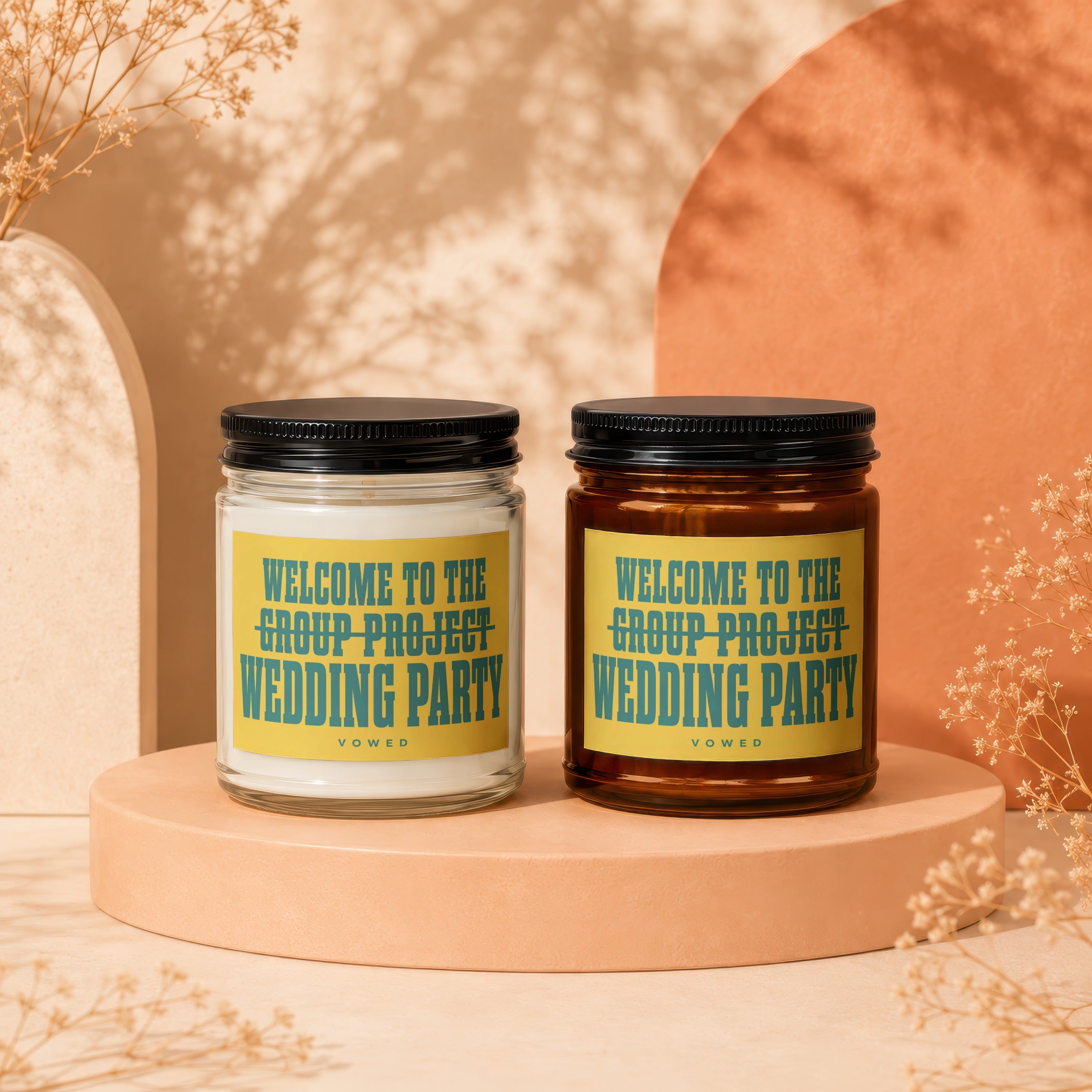 Two candles with yellow labels reading "Welcome to the Group Project Wedding Party Vowed".
