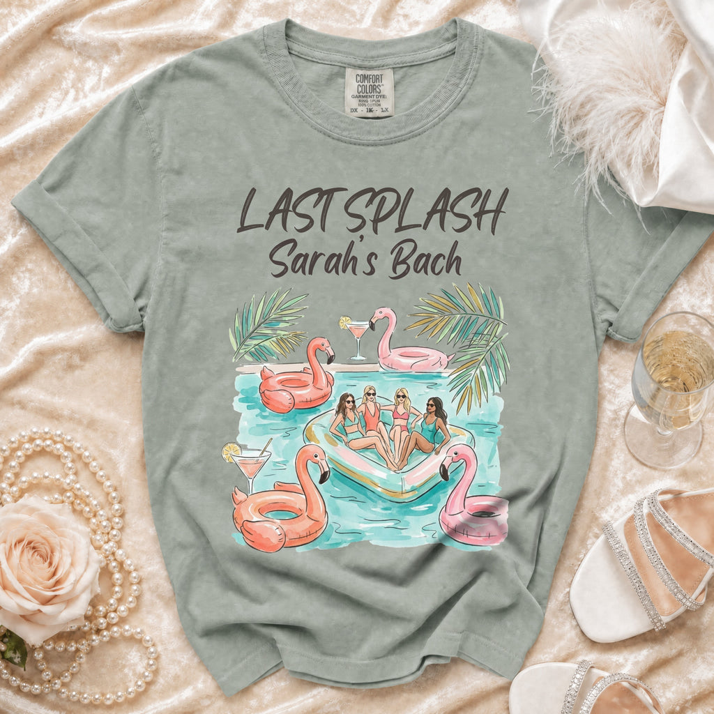 "Last Splash Sarah's Bach" graphic tee with flamingo floaties and palm leaves.