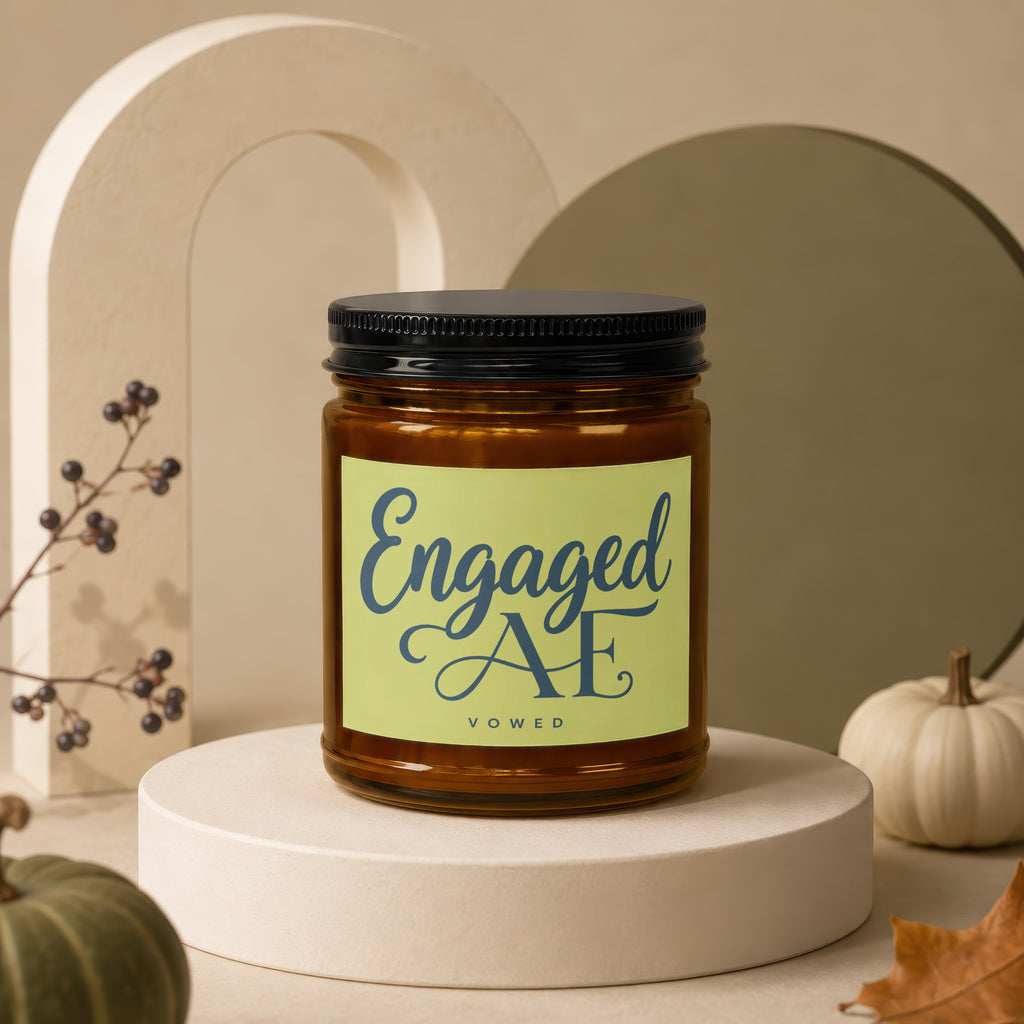 Amber candle with 'Engaged AF' and 'Vowed' text on a pale green label.