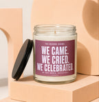 Jar candle with text "We Came. We Cried. We Celebrated."