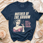 Navy t-shirt with "Mother of the Groom" text and a woman holding champagne.