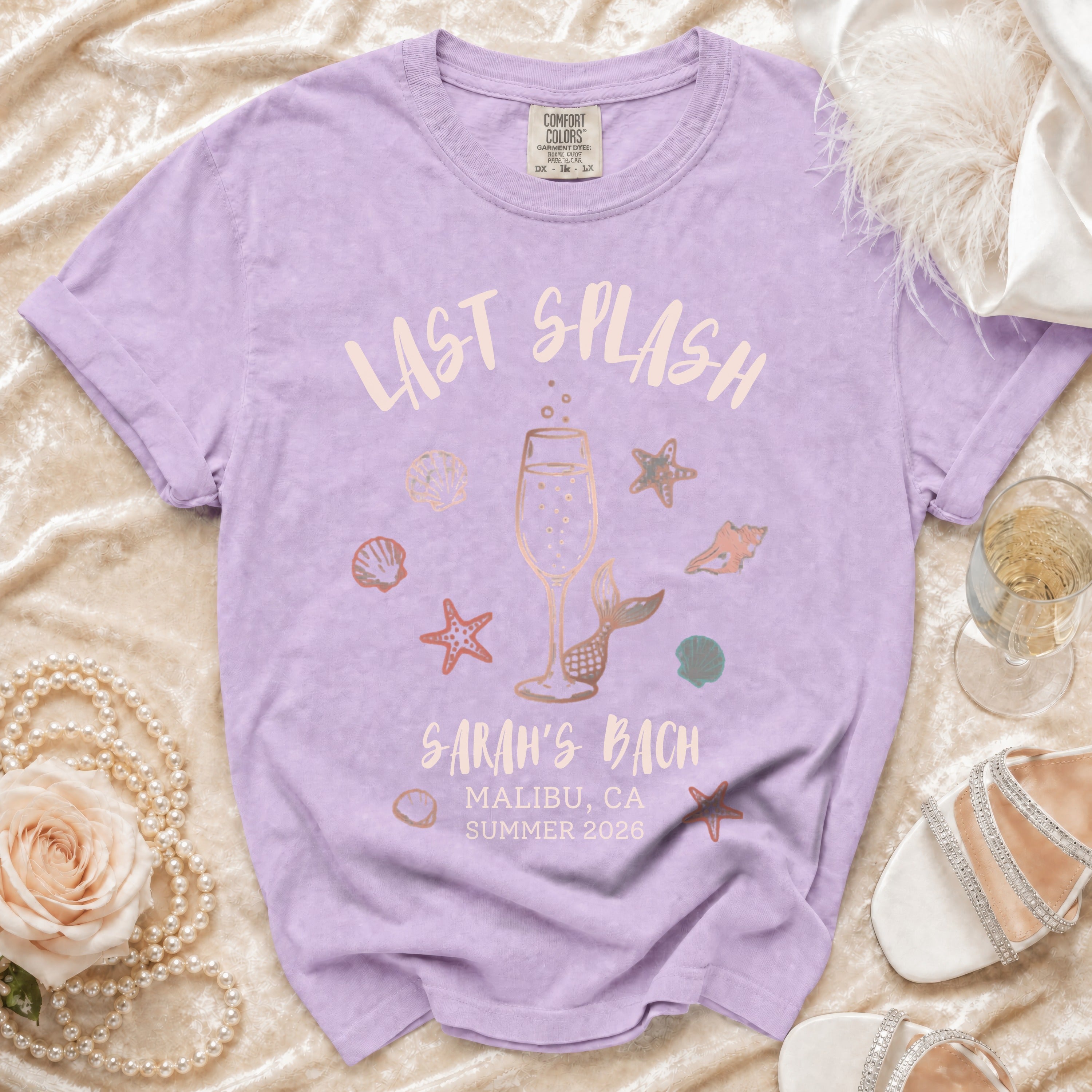Lavender t-shirt with "Last Splash Sarah's Bach Malibu CA Summer 2026" text.