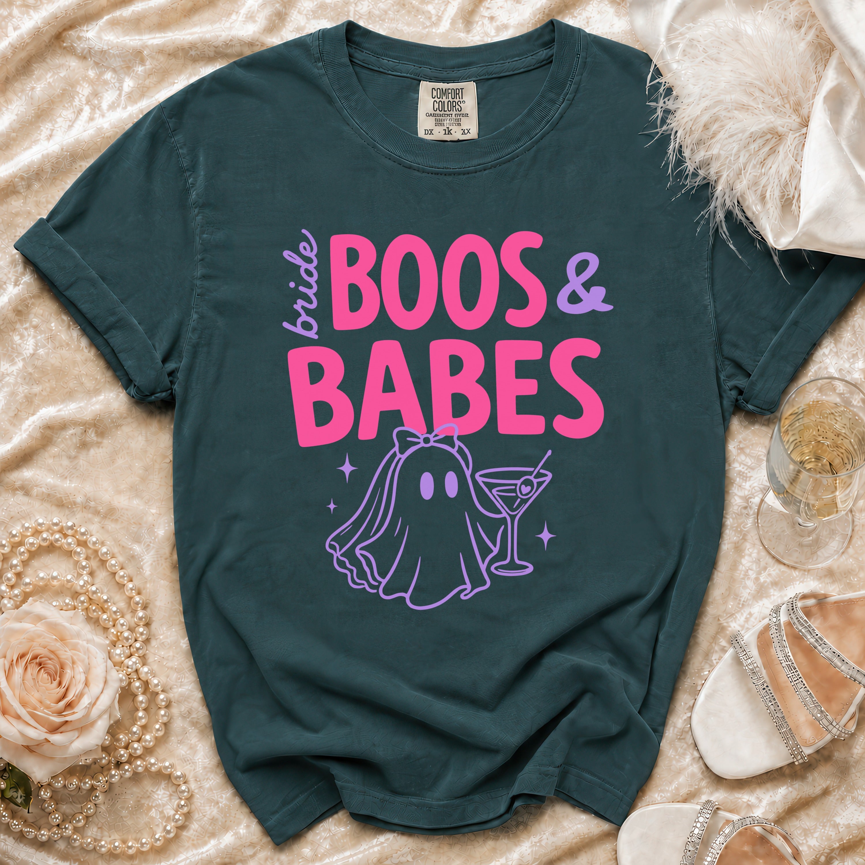 Dark teal t-shirt with "Bride Boos & Babes" text and ghost graphic.