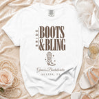 A white t-shirt with brown text reading Bride Boots & Bling, a cowboy boot graphic, and Grace's Bachelorette Austin, TX.
