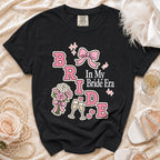 Black t-shirt with "BRIDE In My Bride Era" text and graphics.