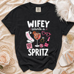 Black t-shirt with "Wifey Wants a Spritz" graphic including drink and accessories.