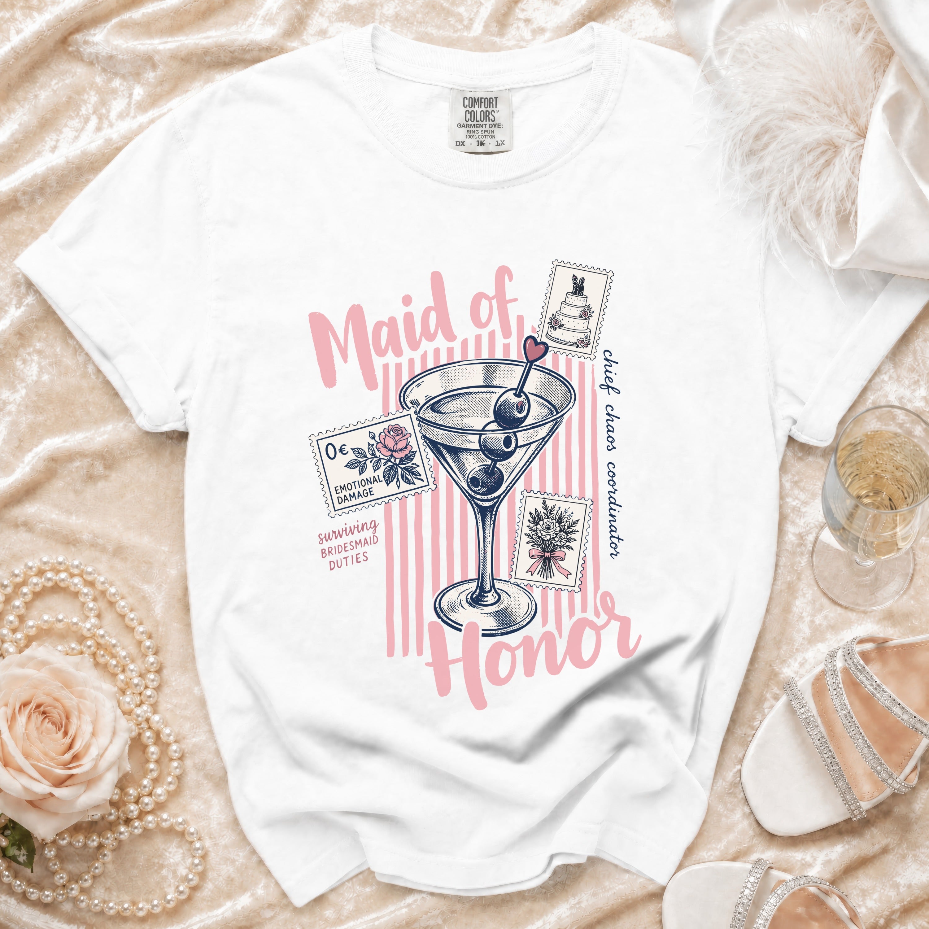 White t-shirt with "Maid of Honor" text, martini glass, and wedding stamps.