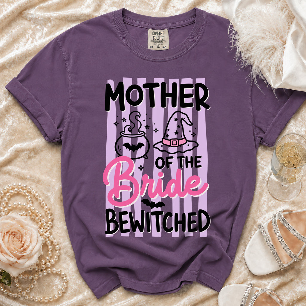 Purple t-shirt with "Mother of the Bride Bewitched" text and Halloween graphics.
