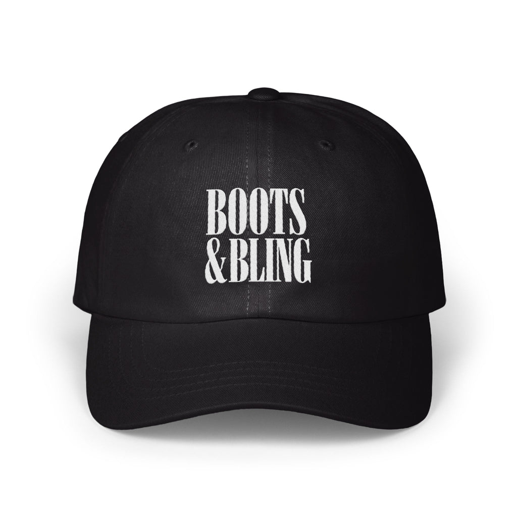 A black baseball cap with white embroidered text reading BOOTS & BLING centered on the front.