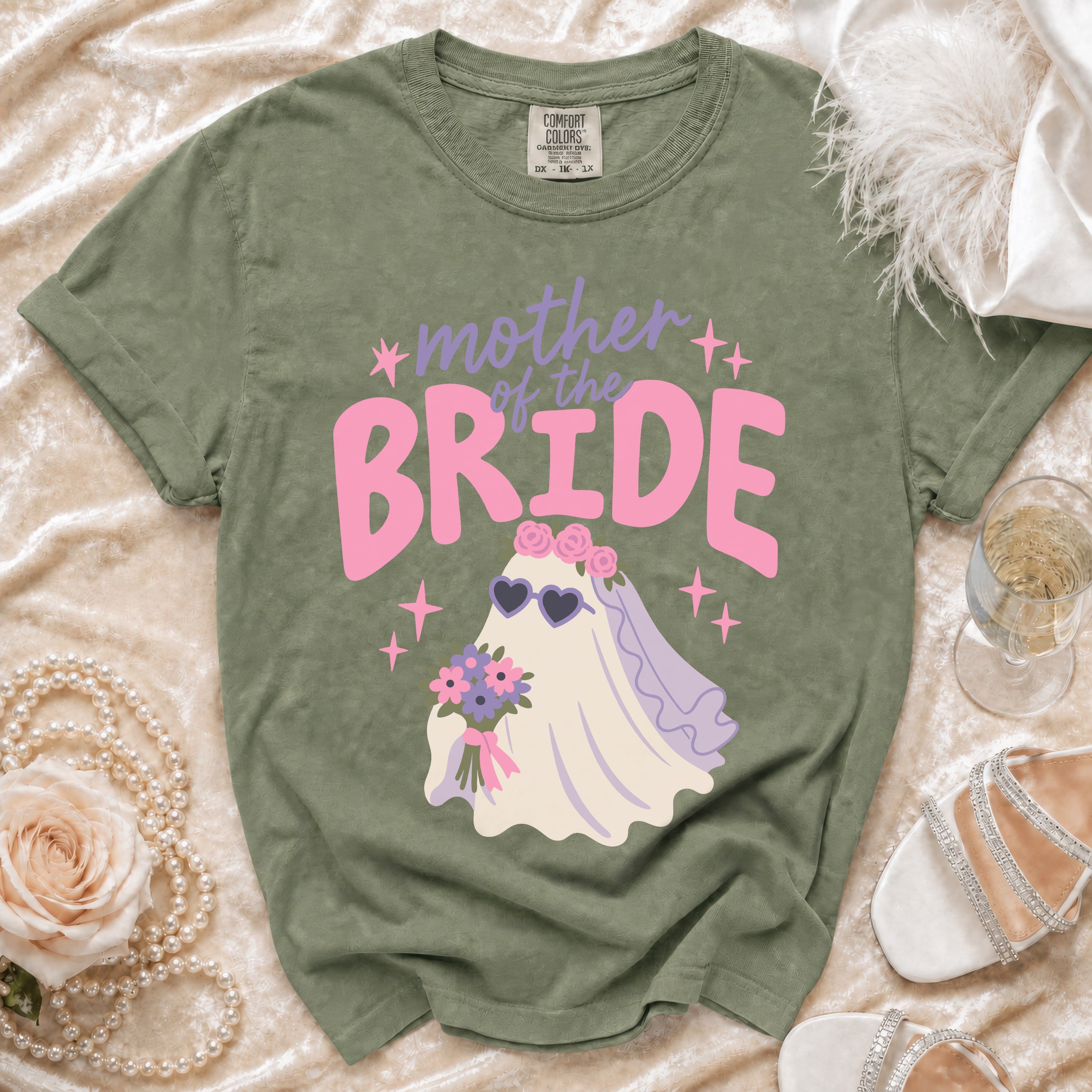 Green t-shirt with "Mother of the Bride" text and ghost graphic.