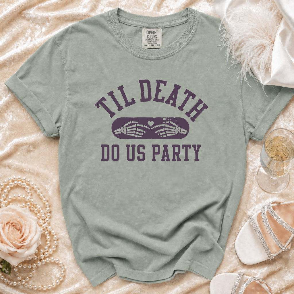 T-shirt with "Til Death Do Us Party" text and skeleton hands making a heart.