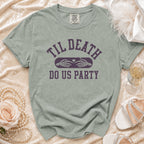 T-shirt with "Til Death Do Us Party" text and skeleton hands making a heart.