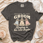 "Mother of the Groom" t-shirt with bells and "Ringing in his next chapter" text.