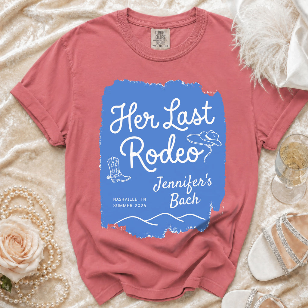 Coral t-shirt with "Her Last Rodeo Jennifer's Bach" in blue text and Western graphics.